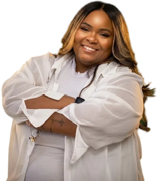 Kayla Life, arms crossed and smiling, Founder & CEO of RebrandLand AI and Founder & Executive Director of RITE